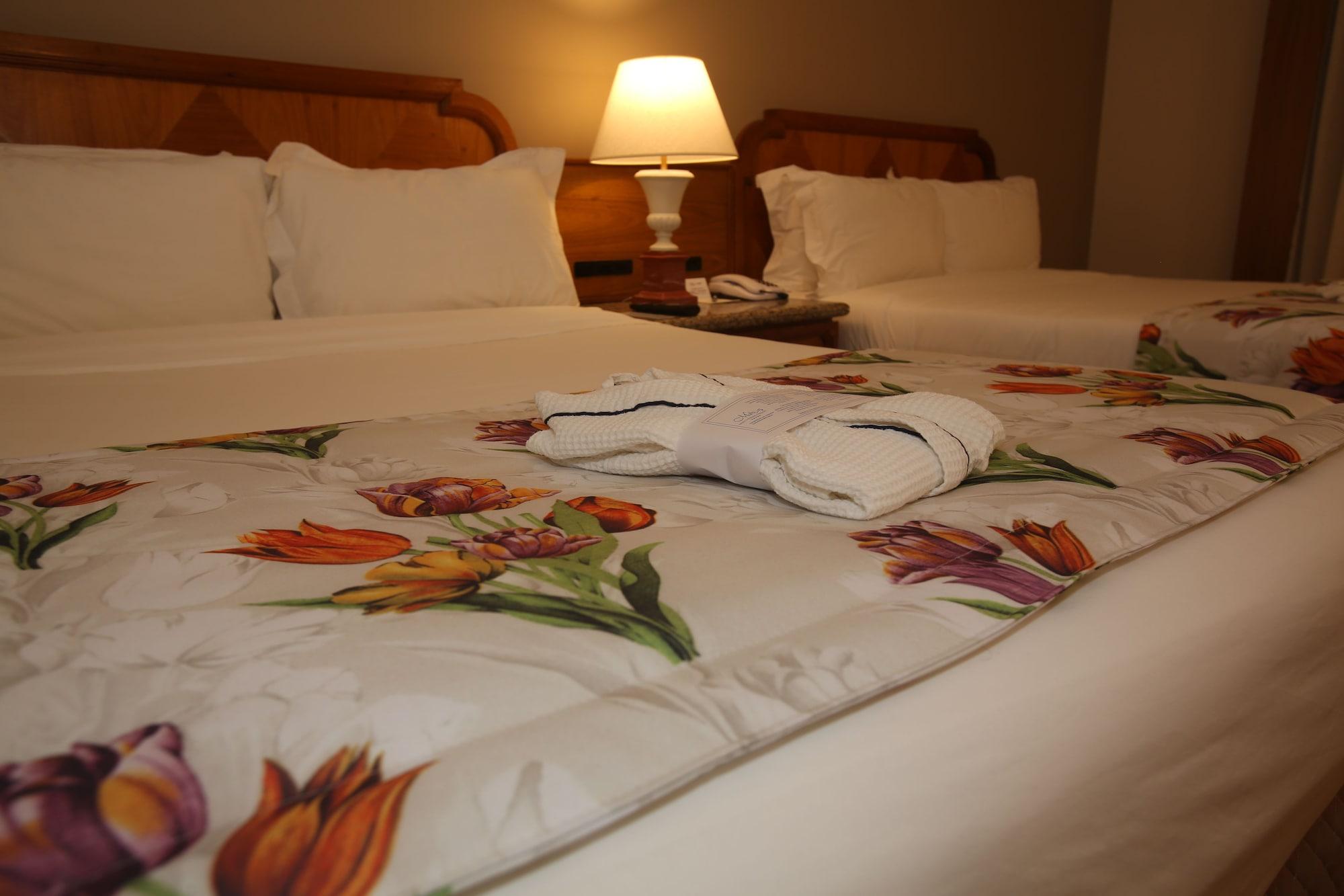 Mabu Thermas Grand Resort Foz do Iguaçu Exterior foto A bed with a duvet